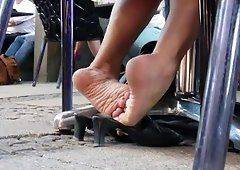 Thai girls barefoot dipping birkenstocks