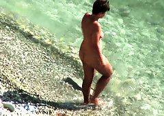 Tanned beautiful womantopless beach voyeur