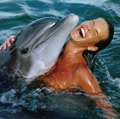 Girl having orgasm with dolphin