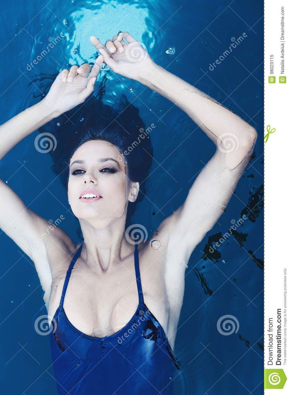 Blue bikini brunette pool