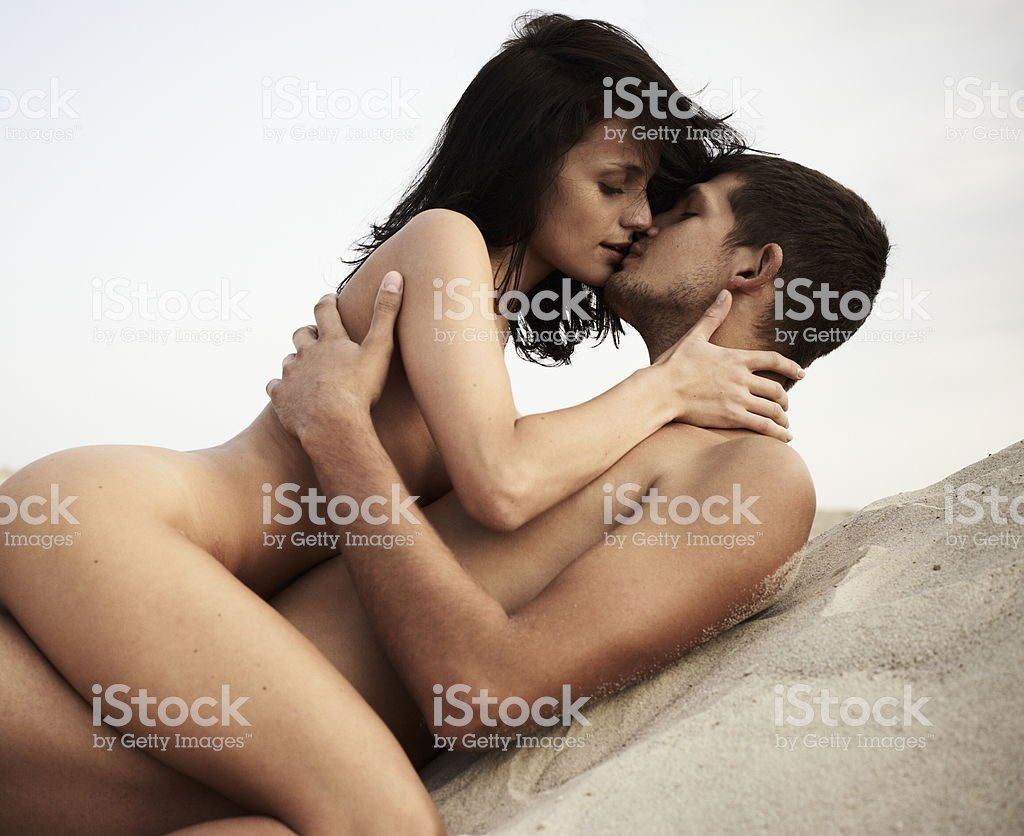 Man nude kissing girlfriend