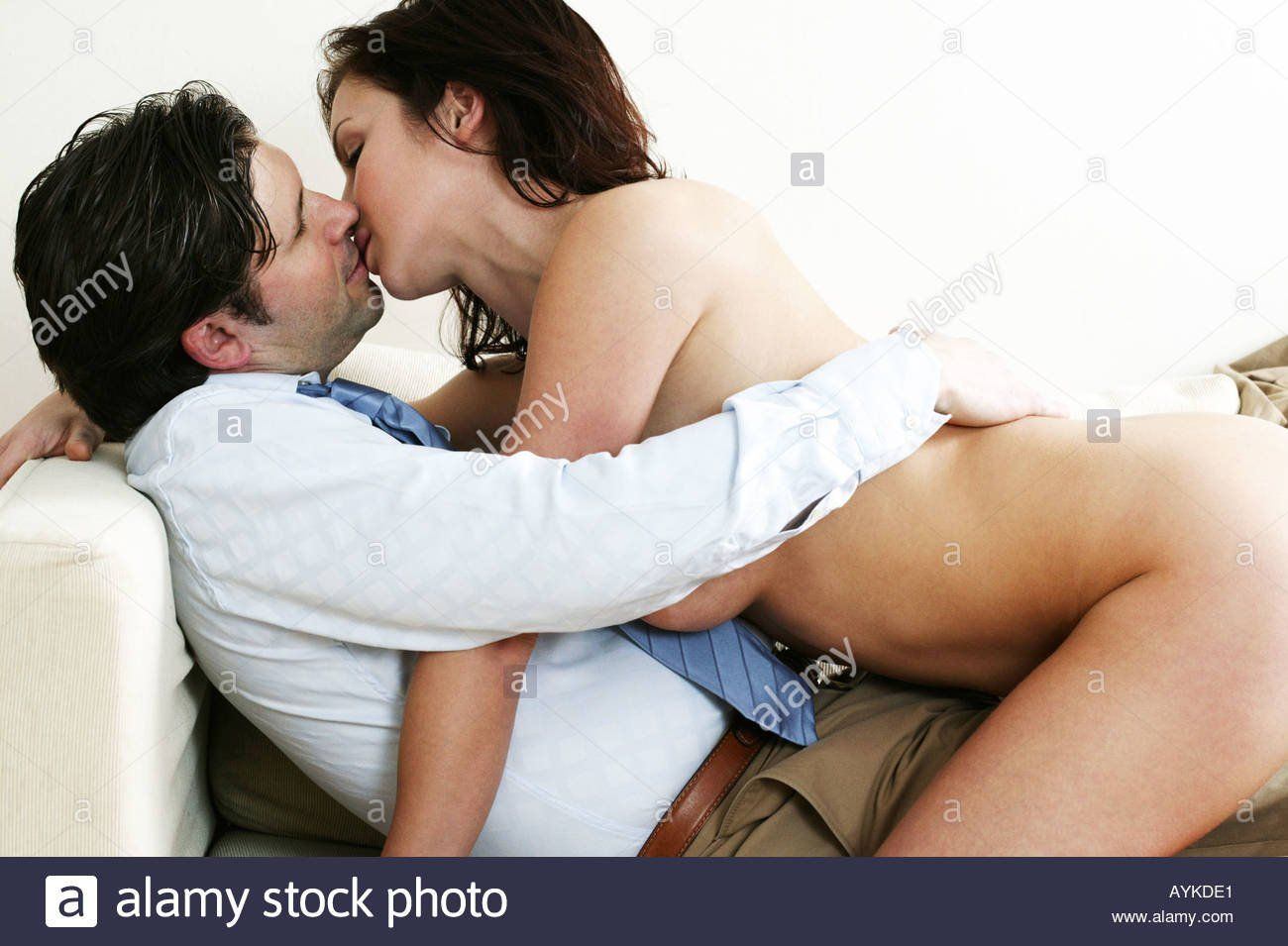 Man nude kissing girlfriend