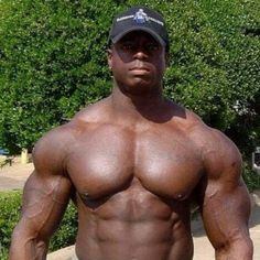 Black body builder with sexy teenager