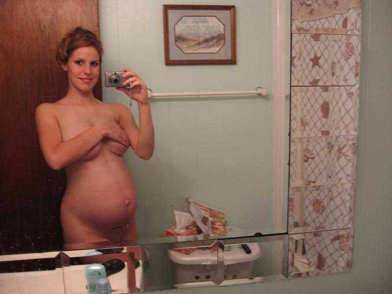 Naked pregnant women undressing