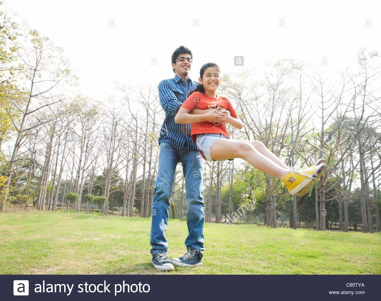 Vi-Vi reccomend A father swinging his daughter