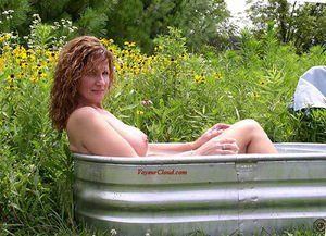 Nude women wash tub
