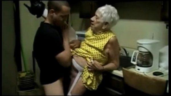 Horny granny with saggy tits fucked by a young guy