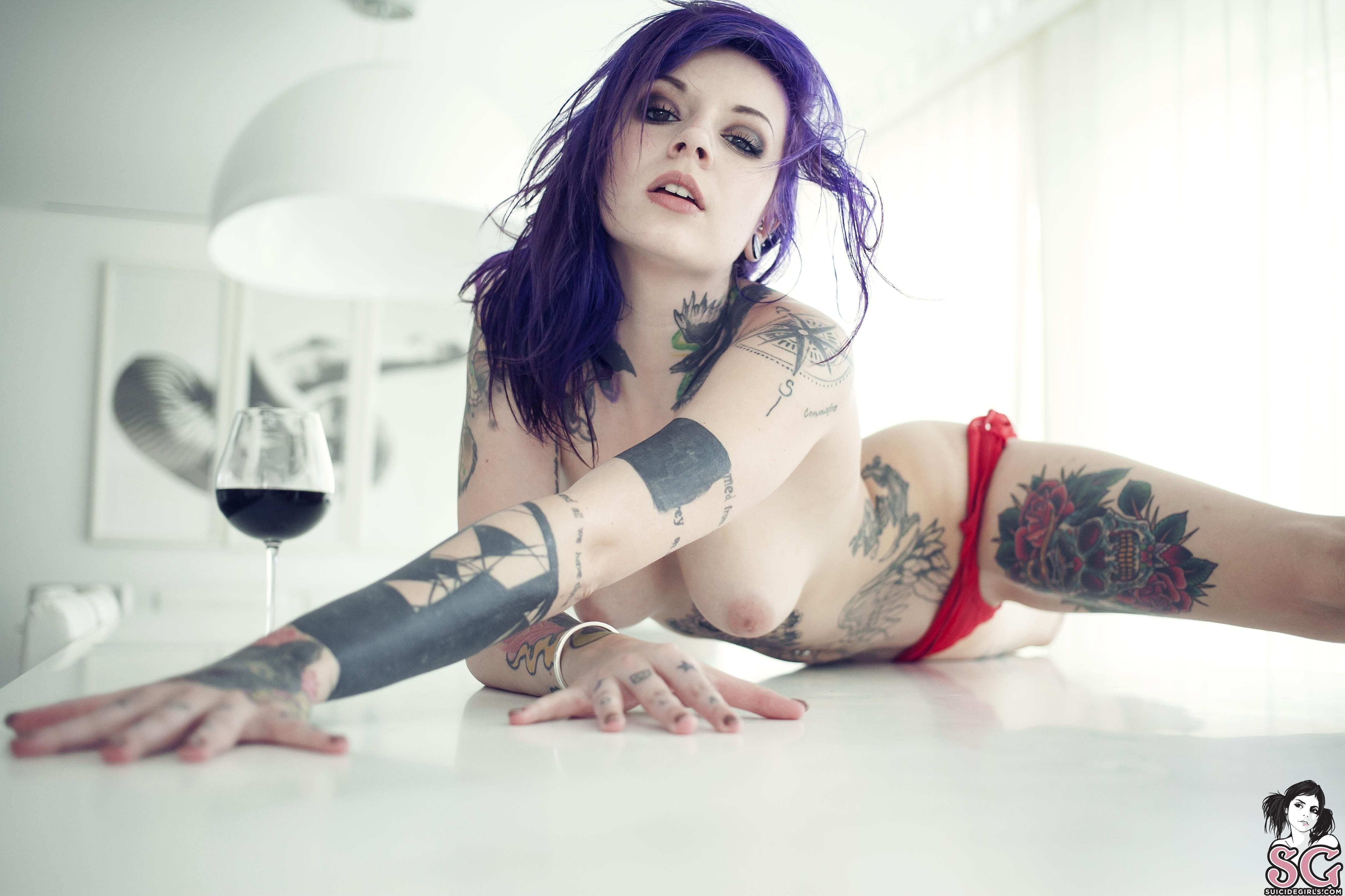 Sexy half naked girls with tattoos